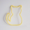 chat tricotin jaune
