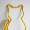 chat tricotin ocre