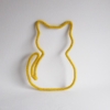 chat en tricotin ocre