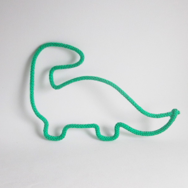 dinosaure tricotin vert