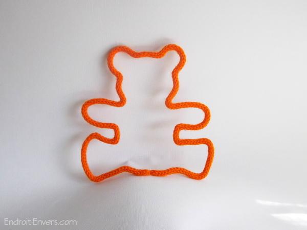 ourson tricotin orange