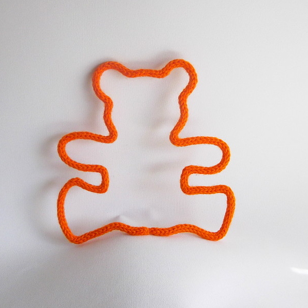 ourson tricotin orange
