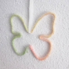 tricotin papillon